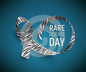 Symbol of rare disease awareness day, ribbon with zebra-print.