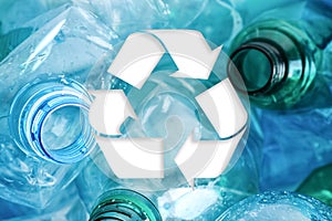 Symbol of recycling and plastic bottles