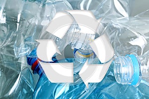 Symbol of recycling and plastic bottles