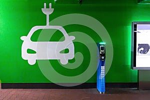 Symbol sign of electric cars charging station. Plug-in charger or socket for PHEV cars or vehicles. Concept of green electricity,