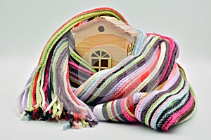 Wooden house sheltered with a scarf photo