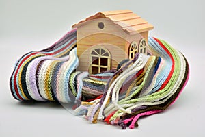 Wooden house sheltered with a scarf photo