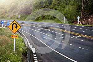 Symbol u-turn warning curve road on the Mountains