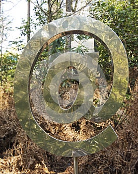 The @ Symbol in the Woods