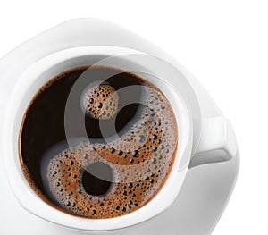 Symbol yin& yang form coffee foam in a cup