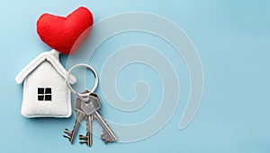 Symbolic homeownership concept keys, house shaped keyring, red heart, copy space