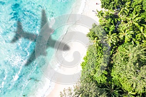 Symbolic picture vacation travel traveling sea airplane flying Seychelles aerial photo beach