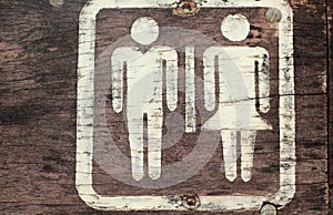 Symbolize toilets on the wooden floor.