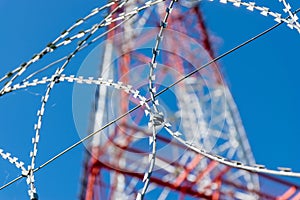 symbolizing the modern way of messaging and communication. the receiving antenna of the TV signal. blue sky background. steel