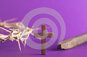 Symbols of the Crucifixion on a Purple Background