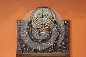 The symbols of the Eucharist, bas relief in Chapel of Saint Dismas in Zagreb, Croatia photo