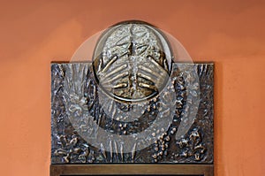 The symbols of the Eucharist, bas relief in Chapel of Saint Dismas in Zagreb, Croatia photo