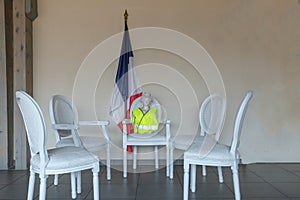 The symbols of the French Republic, Marianne and the French flag during the Great National debate for yellow vests gilets jaunes