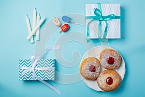 Symbols of hanukkah on blue background