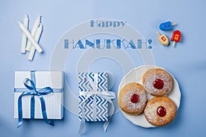 Symbols of hanukkah on blue background