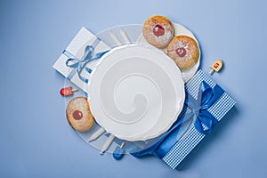 Symbols of hanukkah on blue background