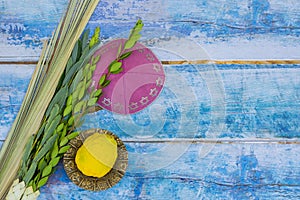 Symbols of Jewish holiday traditions for Sukkot celebrating with etrog, lulav, hadas, and arava