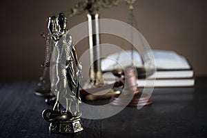 Symbols of law and justice. Dark rustic background
