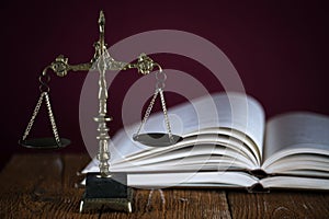 Symbols of law and justice. Dark rustic background