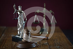 Symbols of law and justice. Themis. Dark rustic background