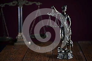 Symbols of law and justice. Themis. Dark rustic background