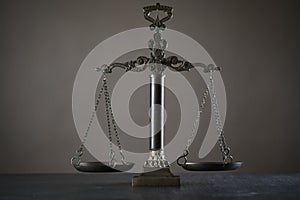 Symbols of law and justice. Themis. Dark rustic background