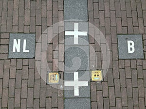 Symbols marking the Baarle-Hertog border between Belgium and Holland