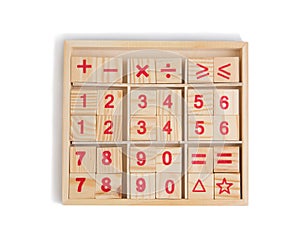 Symbols and numbers wooden blocks. Educational toys