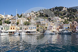 Symi Main Port with Boats and Yachts and Colorful Houses