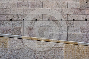 Symmetric modern achitecture stone facade path railing of public