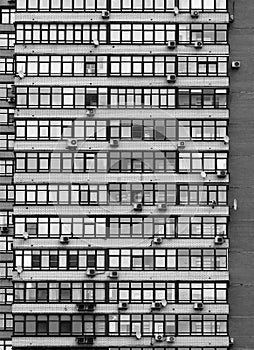 Symmetric windows of many-storied house bcakground