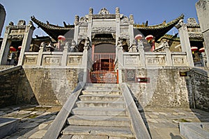 Symmetrical chinese ancient stone decorated archway in Henan, China.