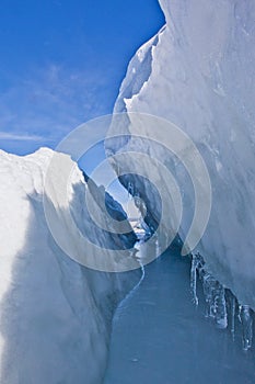 Symmetrical ice crack in the ice mass on lake baikal, blue