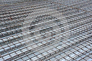 Symmetrical pattern of iron bars in construction site