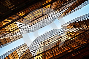 Symmetrical upwards shot of high-rise modern office block, Hong Kong