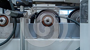 Symmetrical view of industrial rollers and metal machine components