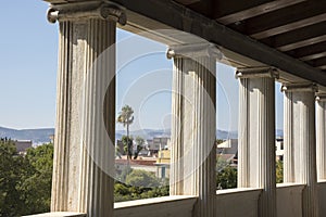 Symmetries and geometries and columns at the Agora of Athens