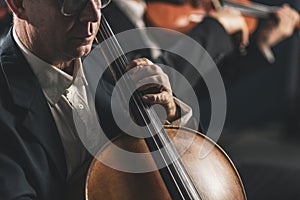 Symphonic orchestra performing on stage