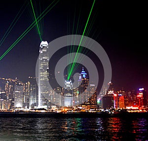 International Finance Centre with green laser lights during Symphony of Lights, Hong Kong