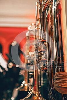 Symphony orchestra on stage, playing the tuba