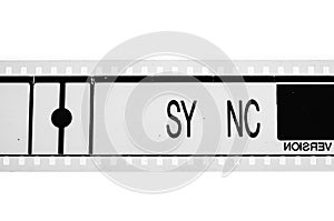 Synchronization sign concept on black and white movie film reel