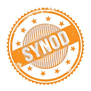 SYNOD text written on orange grungy round stamp