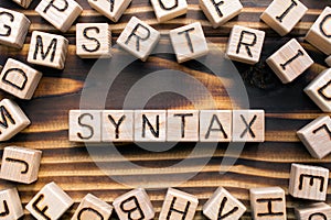 Syntax  composed of wooden cubes with letters