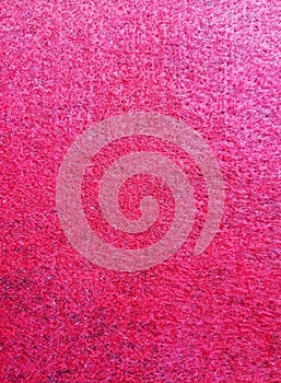 Syntetic carpet texture background in close up