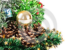 Synthetic Christmas tree with colored balls on branches and fir