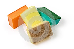Synthetic cleaning sponges different colors on a light background