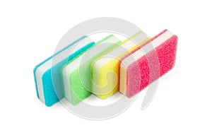 Synthetic cleaning sponges different colors on a light background