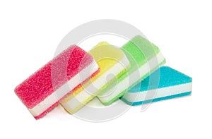 Synthetic cleaning sponges different colors on a light background