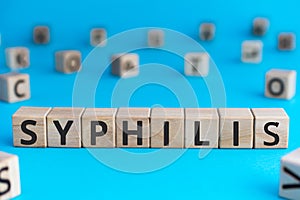 Syphilis - word from wooden blocks with letters