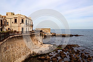 Syracuse - Residential building on the coastline Syracuse (Siracusa), Sicily, Italy, Europe photo